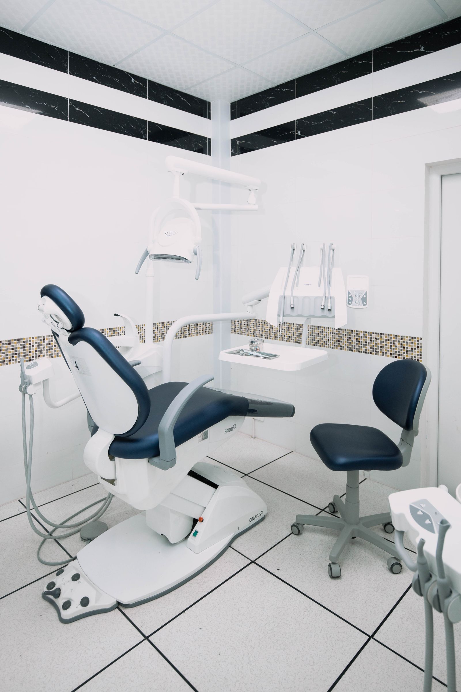 Modern dental clinic treatment room with equipment